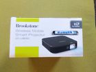 318023 Brookstone Wireless Mobile Smart Projector