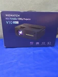 Wifi Bluetooth Projector, Wewatch Native 1080P Mini Portable 260". Fixed Price $46.02.