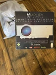 Amplify By Aduro Smart Wifi Projector With 120 Portable Screen. Fixed Price $45.00.