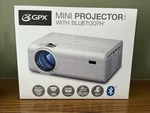 New Gpx PJ308W 1080P Mini Projector W/ Bluetooth. Fixed Price $39.99.