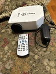 Taotaole Led Projector UC30 Mini Tabletop Usb, Hdmi & Vga Inputs. Fixed Price $25.50.