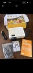 Artsea Portable Bluetooth Mini Hd 1080P Movie Projector, White. Fixed Price $30.00.