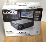 Nib Locus L1050 Android Smart Projector With 72" Self Lock Screen 4K 3D Wifi. Fixed Price $499.00.
