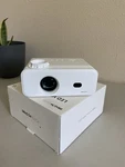 Mini Projector. Fixed Price $80.00.