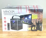 Minolta Mini Projector MN674 Bundle With 100" Screen Remote Brand New Free Ship. Fixed Price $67.39.