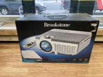 New Brookstone Cineplay All-in-one Home Theater 2-1 Projector & Screen Kit. Fixed Price $39.99.