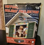 Mr Christmas Virtual Holiday Window Projector Open Box. Fixed Price $20.00.