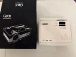 Qkk AK-81 4500 Lumens Projector With Tripod. Fixed Price $50.00.