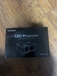 Topvision T6 Mini Projector +100" Screen 7500 Lumens Hd Supported Roku Firestick. Fixed Price $50.00.