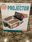 Yorkshire Projector In Box Uses Smartphone (plays Movies & Show Photos). Fixed Price $7.95.