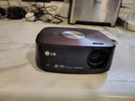 Lg HX300G-JE Microportable Dlp Projector. Works Great. Fixed Price $50.00.