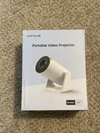Wimius S27 Portable Video Wifi Projector With Built-in Stand. Fixed Price $100.00.