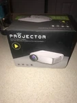 Aduro Amplify VP20 Home Entertainment Multimedia Projector. Fixed Price $40.00.
