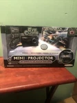 Jakks Pacific Eyeclops Mini Led Projector Portable For Up 60" Screen New Open. Fixed Price $23.99.