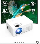 Mini Projector, 2023 With Wifi And Bluetooth, 9500 Lux Movie. Fixed Price $25.00.