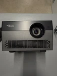 Optoma UHL55 4K Uhd Led Smart Projector Hdr Alexa Bt 4414 Hrs W/ Case & Remote. Fixed Price $350.00.