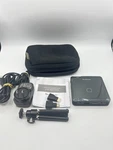 Brookstone 801143 Dlp Mini Projector W/ Tripod & Power Adapter Tested. Fixed Price $56.88.