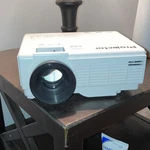HI-04 Mini Projector Lcd Led White Desktop Home Theater Hdmi Usb Vga Av Tf. Fixed Price $200.00.