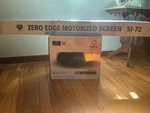Ennea E8K-8900 Projector With Custom Cut Movie Screen. Fixed Price $2500.00.
