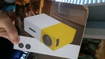 YG300 Led Multimedia Projector Yellow White Mini Home Theater. Fixed Price $20.00.