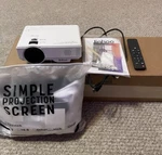 Jinhoo M10 Mini Projector - Screen Included. Fixed Price $40.00.