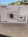 Aurzen Eazze D1 Smart Projector With Wifi And Bluetooth, White. Fixed Price $60.00.