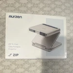 Aurzen Zip Tri-fold Ultra Portable Dlp Projector Native 720P Gold Airlink. Fixed Price $380.00.