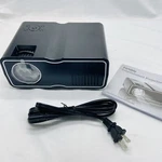 Sharper Image Portable Entertainment Projector, Display's Up 120 Inch Read. Fixed Price $44.95.