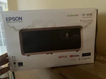 Epson EF-100B 3LCD Android Tv Projector W/ Google Assistant, Chromecast. Fixed Price $297.50.