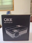 Qkk Mini Projector With Remote And 100 Inch Screen. Fixed Price $49.94.