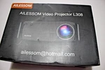 Ailessom Video Projector L308 Native 1080 5G Wifi Bluetooth. Fixed Price $240.49.