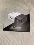 YG300 Led Multimedia Projector Tft Lcd 1920X1080 Support MP3 Wma Flac Compatible. Fixed Price $60.00.