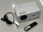 Febfoxs Led Projector Model # JQ450 Hd Video 400 Lumens Wi-fi 10,000:1. Fixed Price $29.99.