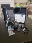 Portable Qkk Mini Projector Model QK01 With All Cables, Stand Remote Case. Fixed Price $31.49.