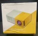 New (nib) Nsi YG300 Portable 1080P Led Projector - Blue/white. Fixed Price $25.00.