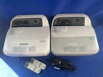 Epson BRIGHTLINK485WI & BRIGHTLINK595WI Short Throw Projectors W/remotes - Lot 2. Fixed Price $250.00.