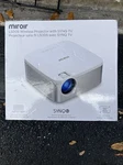 The Miroir L500S Wireless 1080P Projector Synq Tv 90-INCH Screen Movie Projec.... Fixed Price $136.49.