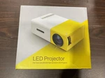 Deeplee Portable Mini Projector Led Video For Home, Travel Yellow Nib. Fixed Price $15.00.