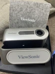 Viewsonic M1+G2 Beam Projector Mini Harman Kardon Speaker. Fixed Price $710.00.