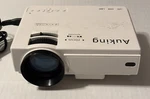 Auking Mini Projector Model A008 No Remote 100-240V Led Usb Lcd. Fixed Price $22.00.