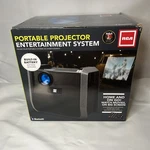 Rca RPJ060 Home Theater Projector W/ Built-in Speaker Black/graphite New Box. Fixed Price $60.00.