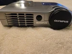 Olympus VP-1 Ultralight Portable Mini Mobile Dlp Digital Projector Remote & Case. Fixed Price $45.00.