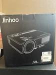 Jinhoo PJ0551 Home Theater Projector White Model For Entertainment. Fixed Price $68.00.