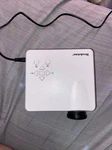 Brookstone Miniplay Projector. Fixed Price $20.00.