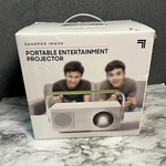 Sharper Image Portable Entertainment Projector Brand New Open Box. Fixed Price $22.00.