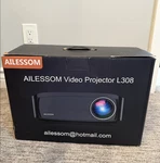 Ailessom Video Projector L308 New In Box Never Used. Fixed Price $100.00.
