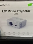 Dragon Touch Mini Projector With 5G Wifi 6 And Bluetooth, Support Fhd 1080P. Fixed Price $20.00.