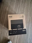 Epson EF-12 Android Tv 3LCD Desktop Laser Projector, Hdmi, Black. Fixed Price $450.00.