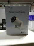 Wimius S27 Portable Video Wifi Projector With Built-in Stand. Fixed Price $100.00.