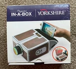 Yorkshire Projector In Box Uses Smartphone (plays Movies & Show Photos). Fixed Price $19.95.